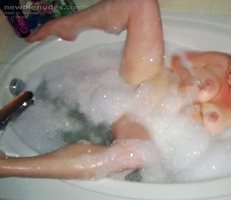 Wife having fun in a bubble bath.  Leave comments let her know what you thi...