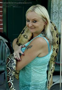 new pics of Sharon in garden with her snake