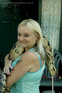 new pics of Sharon in garden with her snake