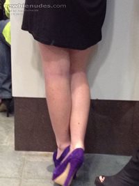 young lady in heels in a cafe