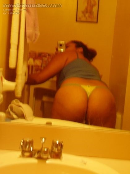 My wife's big butt in a thong.