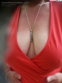 Do you like her cleavage in red top, with her fat nipples ready to burst?