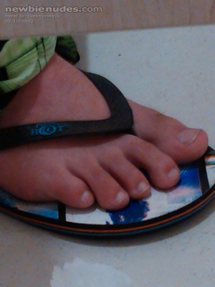 Toilet cubicle, shopping centre. Foot next door, made me wank. I got a stiff and I wanked!