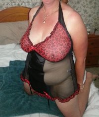sum sexy lingerie to show her big tits and fat nipples thru, shes not sure ...