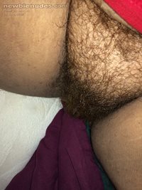 Showing off that hairy pussy while at work.
