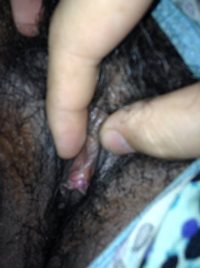Showing off my wife's clit before I start to play.