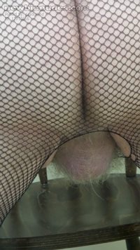 Fishnet suit... covered but exposed!