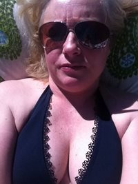 Wife sunbathing