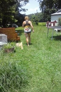 The wife looking and gathering chicken and duck eggs.lol
