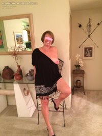 Lindsey sent me a pic of her waiting for me.  Here she bares on breast to s...
