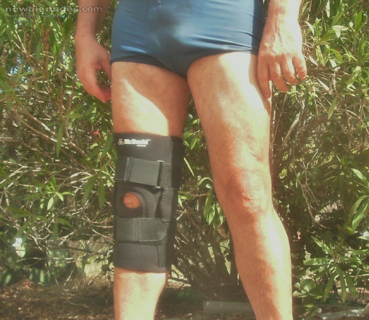 Knee brace and square cut swimsuit.  Pure sexy :)