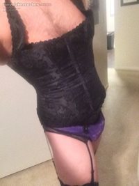 Dressing in some hot lingerie. Umm like someone to play with...