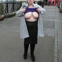 Bare titties on a city street