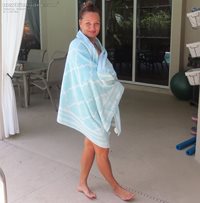 Naked under the pool towel....